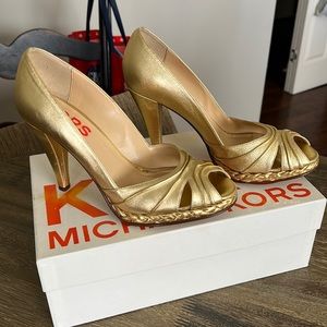 Michael Kors Gold heels.